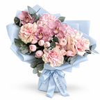 Blush Spectacle: pink orchids, blush roses and pink hydrangea in blue wrapping