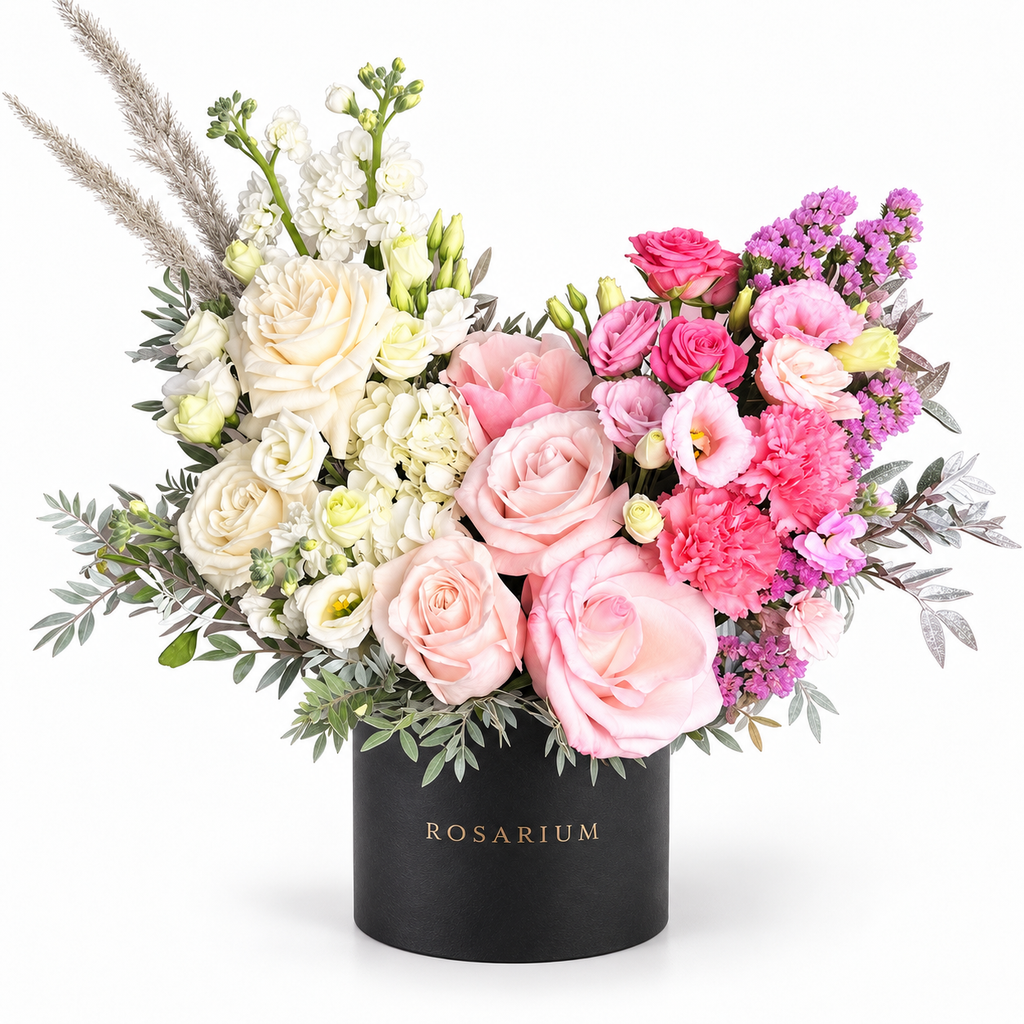 Colour Daydream: ivory and pink roses, white and pink flowers and pampas grass in a black Rosarium flower box