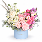 Colour Daydream: ivory and pink roses, white and pink flowers and pampas grass in a blue Rosarium flower box