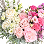 Colour Daydream: close-up of ivory and pink roses, white and pink flowers and pampas grass