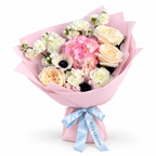 Cream with an Edge: cream roses, white anemones and pink hydrangea in light pink wrapping