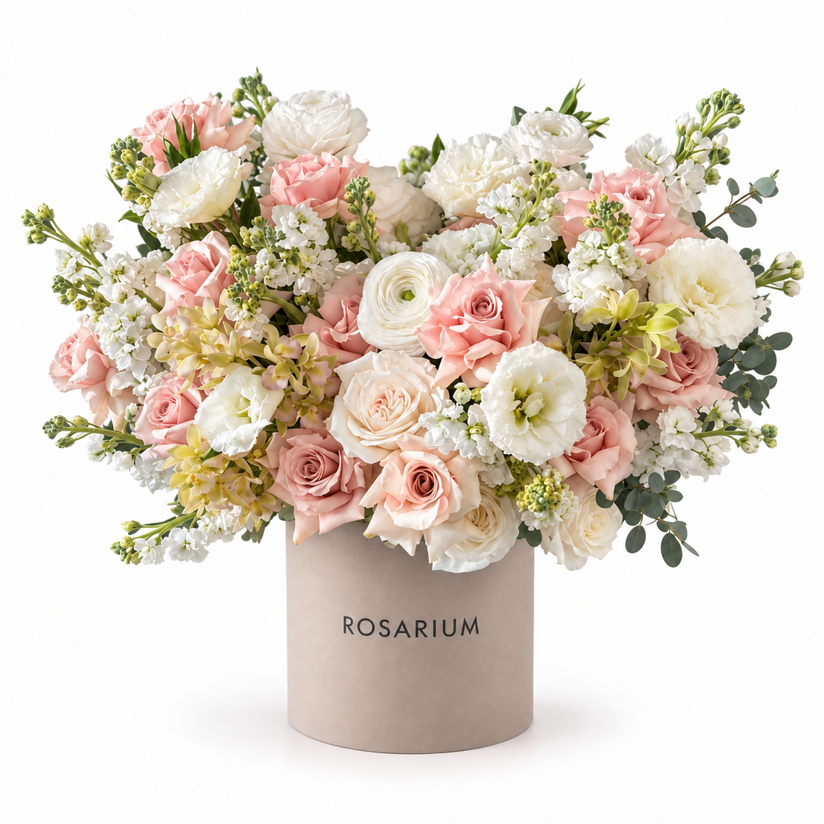 Peach Parfait — Peach and ivory roses, white ranunculus and lisianthus with pale yellow orchid accents, stock and eucalyptus in a taupe box