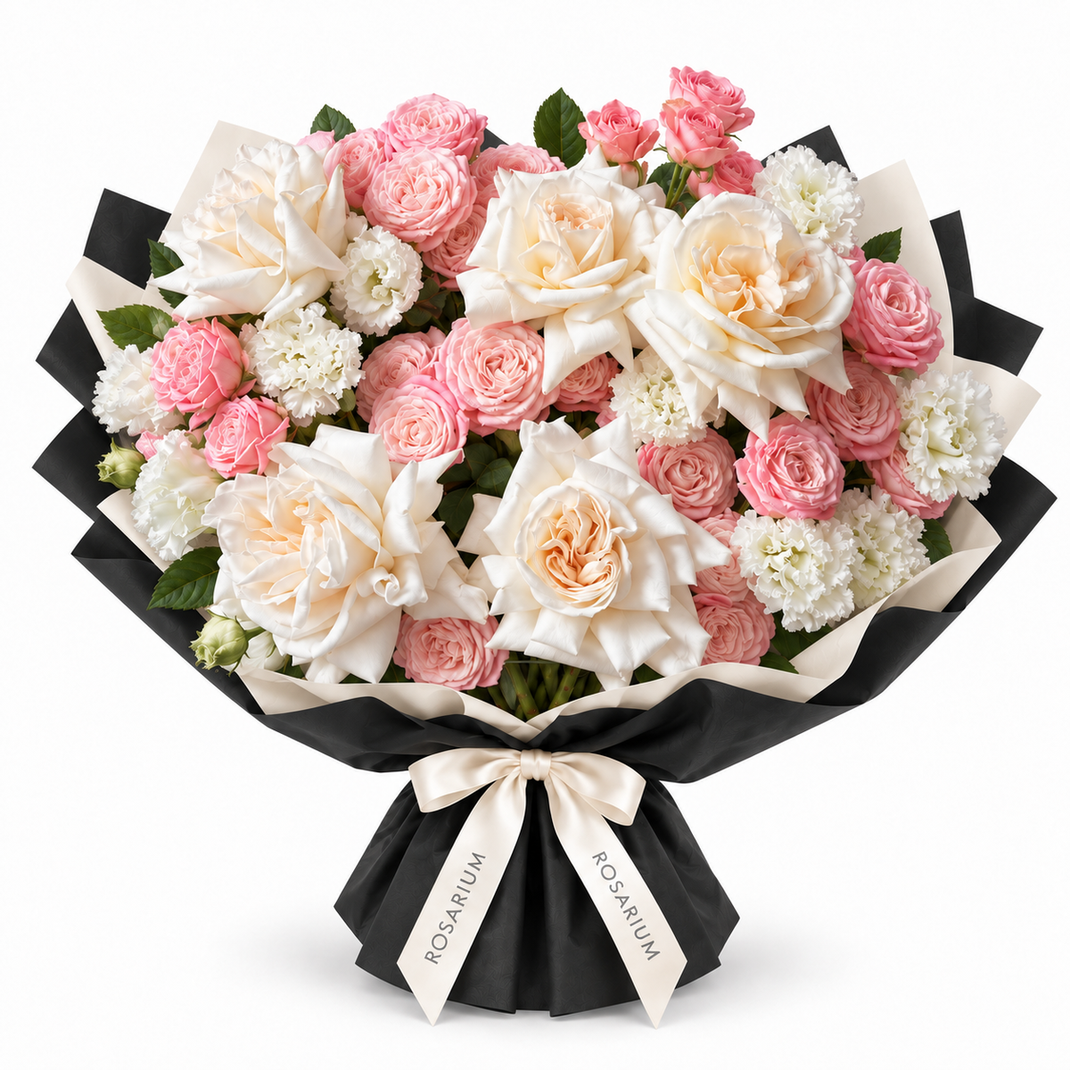 Rose Satin — Large ivory roses, coral-pink spray roses and white carnations with fresh foliage in Rosarium’s black-and-ivory wrapping