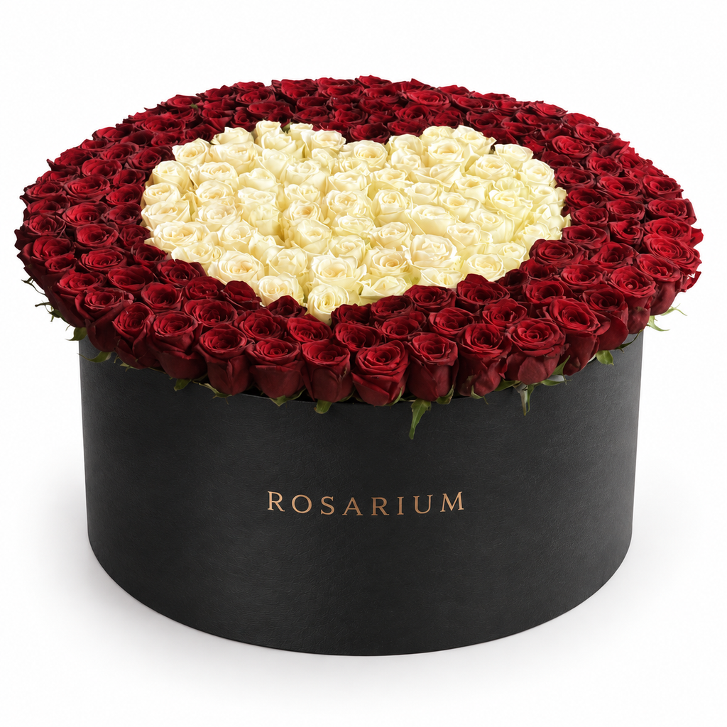 Heart in Contrast Luxe: red roses surrounding an ivory rose heart in a black Rosarium flower box