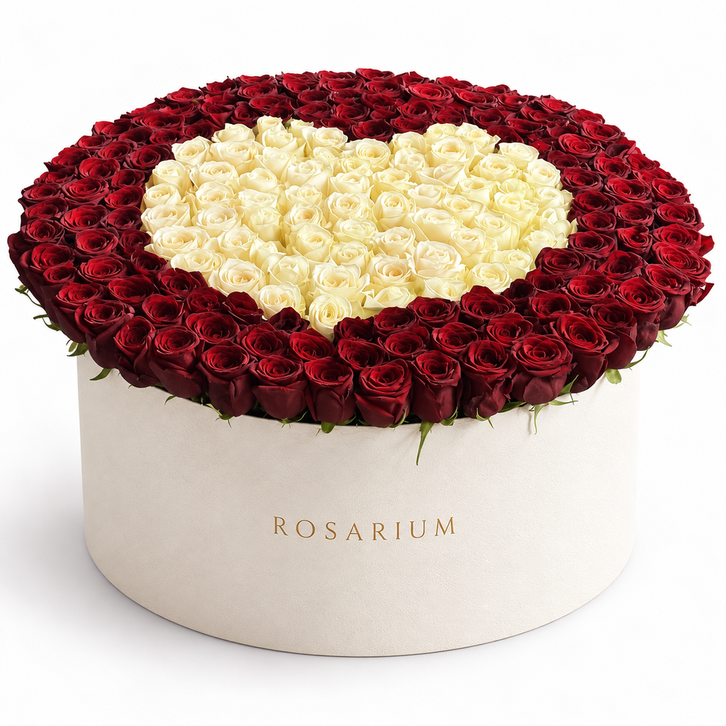 Heart in Contrast Luxe: red roses surrounding an ivory rose heart in an off-white Rosarium flower box