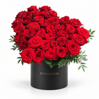 Heart in Red: red roses arranged as a heart in a black Rosarium flower box