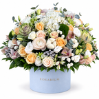 Ivory & Moss: white hydrangea, cream roses, cotton and a green moss accent in a blue Rosarium flower box