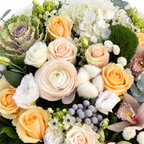 Ivory & Moss: close-up of white hydrangea, cream roses, cotton and a green moss accent