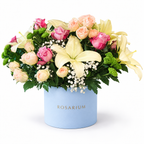 Lily Meadow: yellow lilies, pink and cream roses and greenery in a blue Rosarium flower box