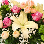 Lily Meadow: close-up of yellow lilies, pink and cream roses and greenery