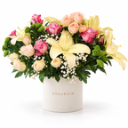 Lily Meadow: yellow lilies, pink and cream roses and greenery in an off-white Rosarium flower box