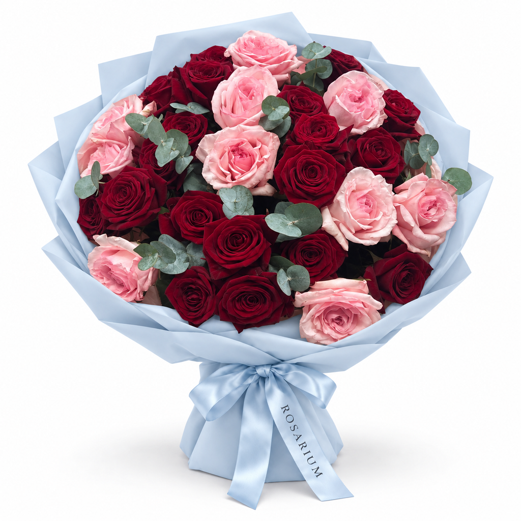 Love, Softened: red and pink roses with eucalyptus in blue wrapping