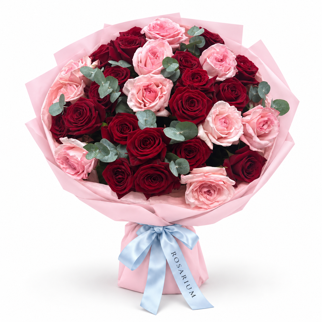 Love, Softened: red and pink roses with eucalyptus in light pink wrapping