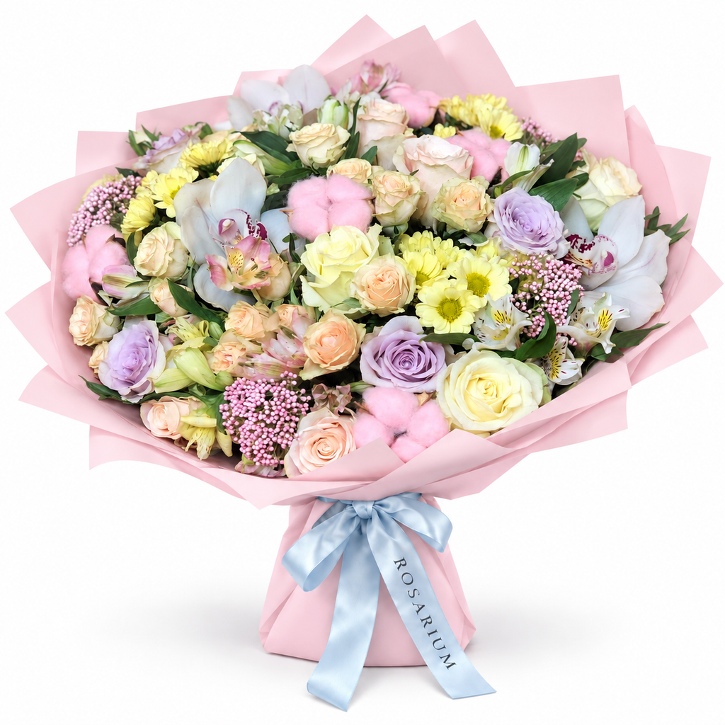 Marina in Colour: pastel roses, white orchids and small yellow flowers in light pink wrapping