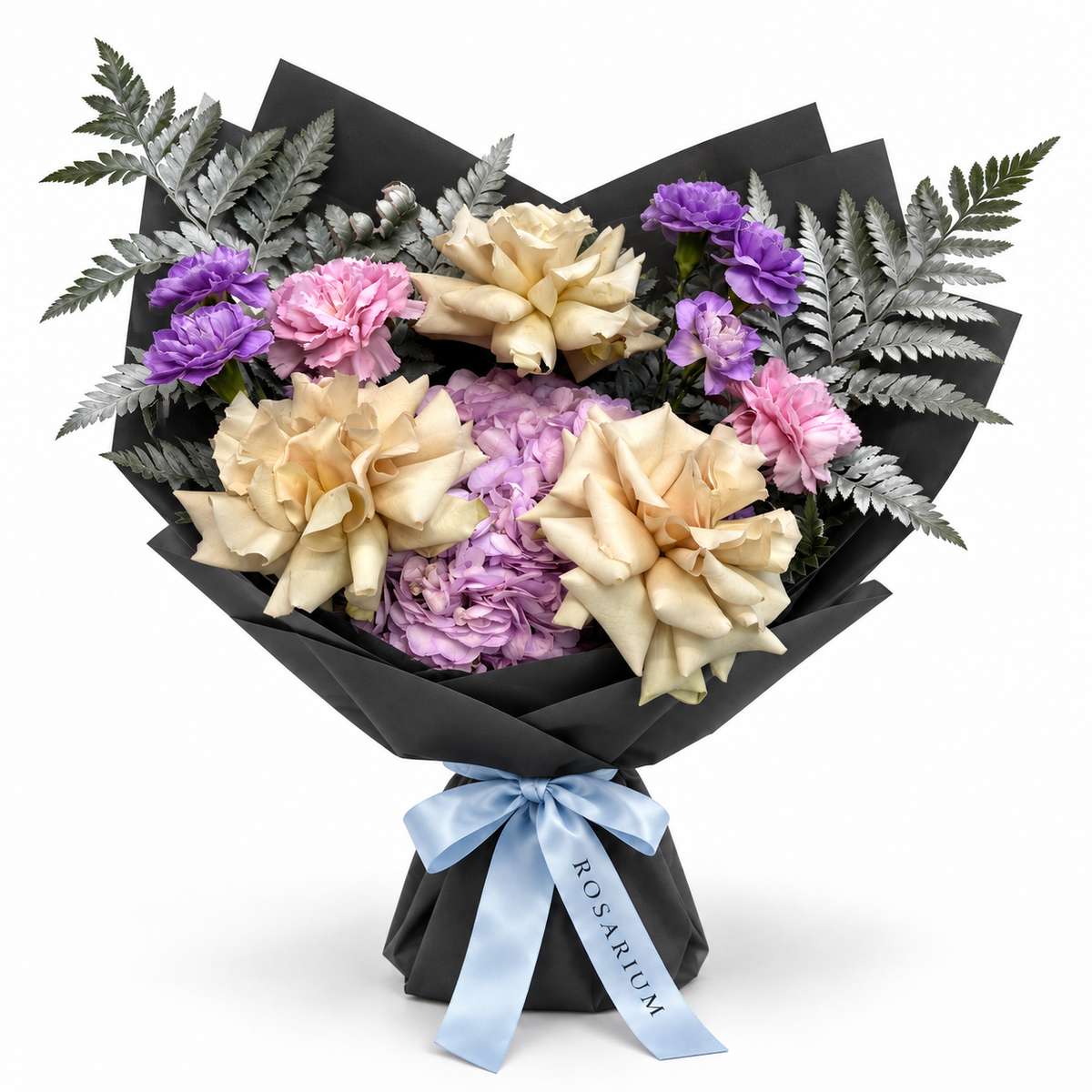 Ocean Hush: muted roses, lilac hydrangea and pink carnations in black wrapping
