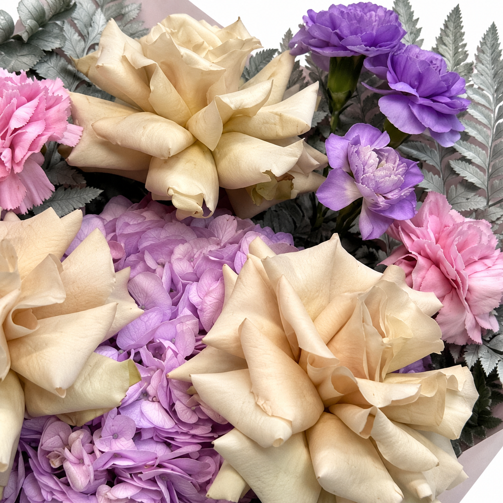 Ocean Hush: close-up of muted roses, lilac hydrangea and pink carnations