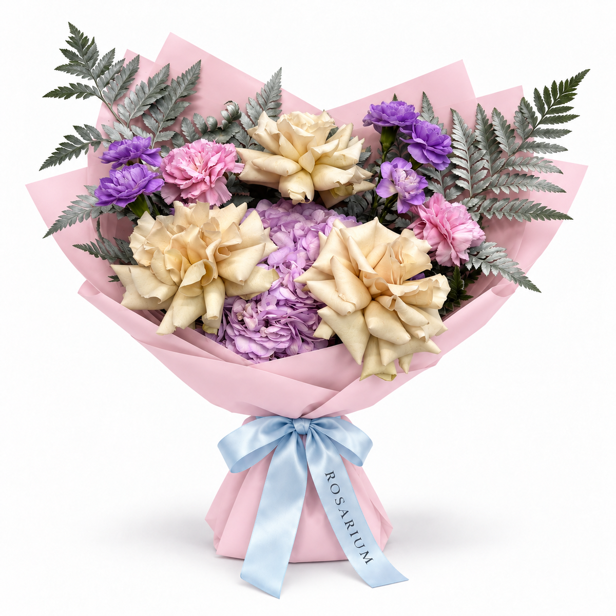 Ocean Hush: muted roses, lilac hydrangea and pink carnations in light pink wrapping