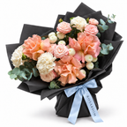 Peach in Bloom: peach roses, pink ranunculus and white flowers in black wrapping