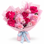 Raspberry Rush: fuchsia roses, pink hydrangea and pink carnations in light pink wrapping