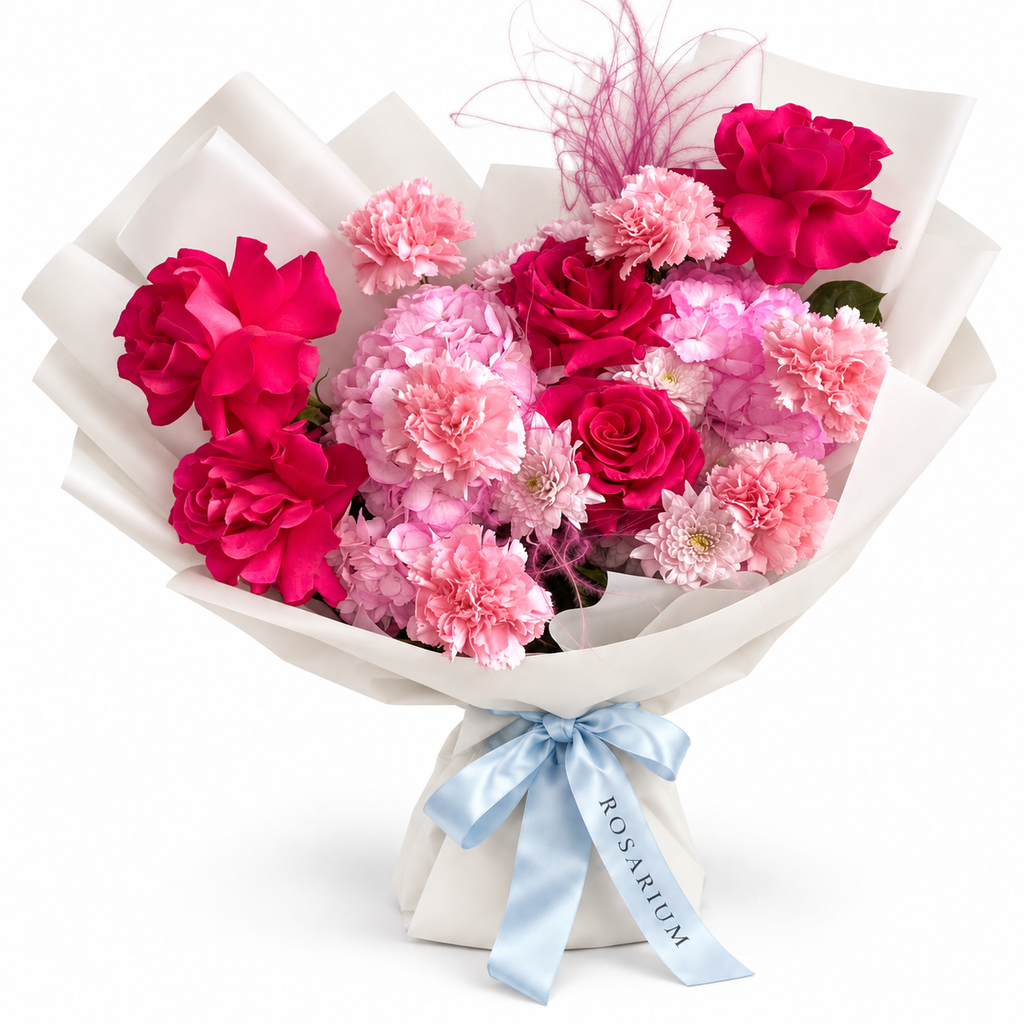 Raspberry Rush: fuchsia roses, pink hydrangea and pink carnations in off-white wrapping
