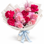 Raspberry Rush: fuchsia roses, pink hydrangea and pink carnations in off-white wrapping