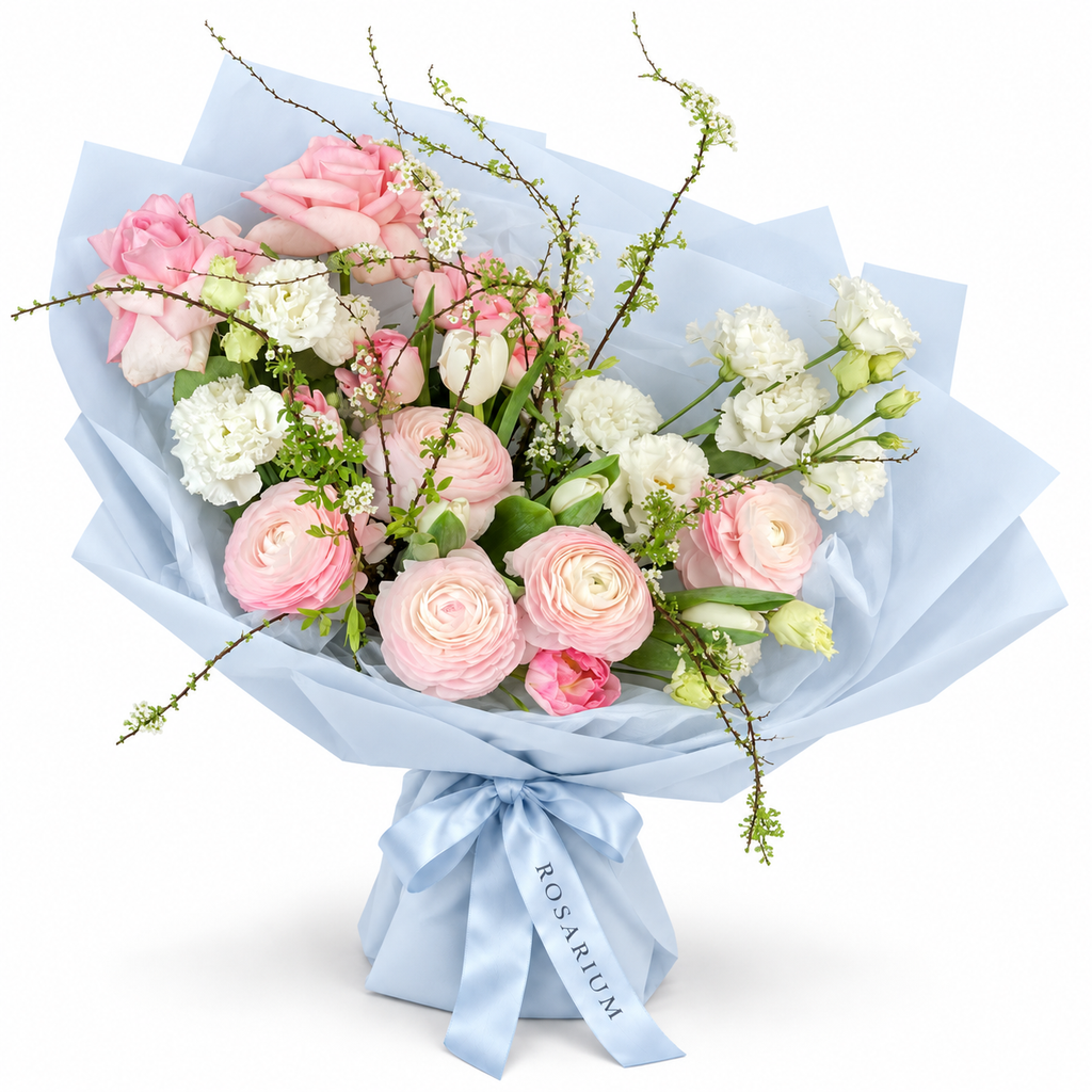 Soft-Spoken Romance: pink roses, white flowers and green branches in blue wrapping