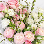Soft-Spoken Romance: close-up of pink roses, white flowers and green branches