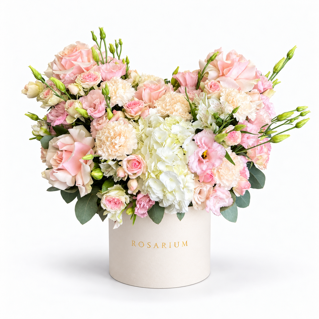 Sugar-Hearted: pink roses and cream flowers arranged as a heart in an off-white Rosarium flower box