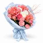 Tuscan Afterglow: coral and pink roses, pink carnations and white flowers in blue wrapping