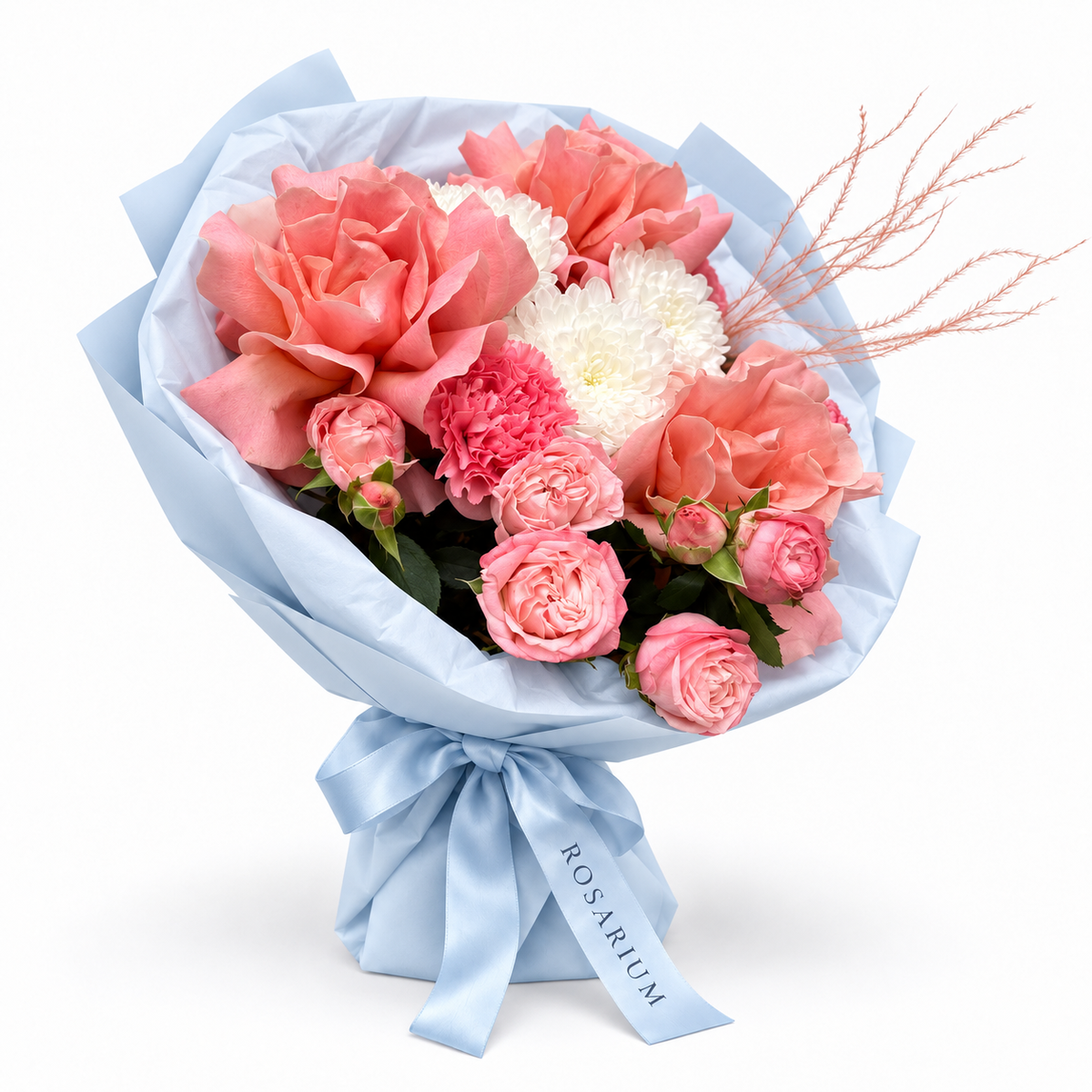 Tuscan Afterglow: coral and pink roses, pink carnations and white flowers in blue wrapping