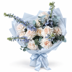 White on Ice: cream roses, blue delphinium and eucalyptus in blue wrapping