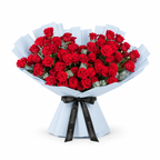 Red roses and eucalyptus in blue wrapping with a Rosarium ribbon
