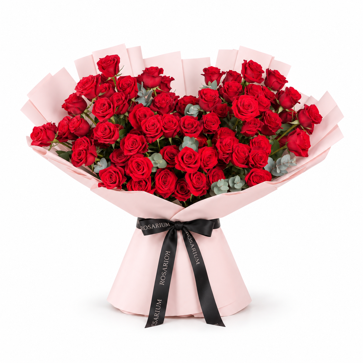 Red roses and eucalyptus in light pink wrapping with a Rosarium ribbon
