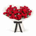 Red roses and eucalyptus in off-white wrapping with a Rosarium ribbon