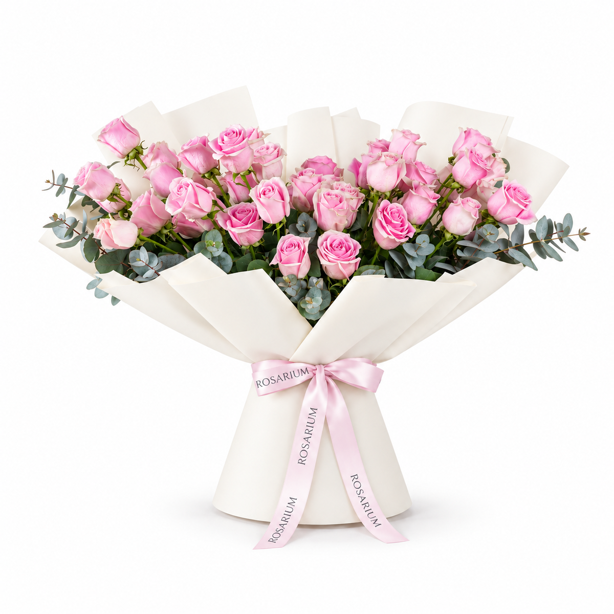 Wide bouquet of pink roses and eucalyptus in off-white wrapping with a Rosarium ribbon